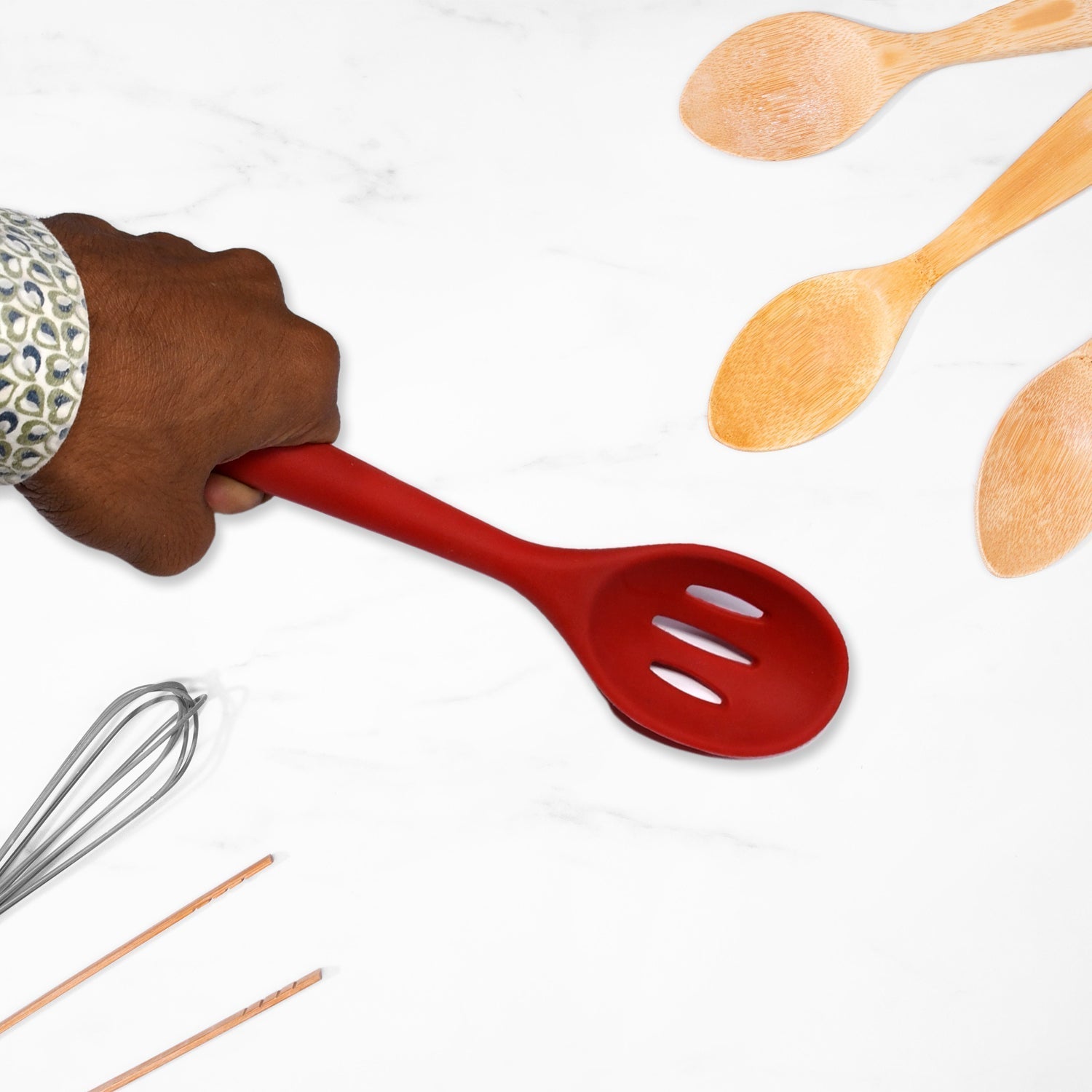 Heat-resistant silicone flipper, perfect for high-temperature cooking tasks like frying.
