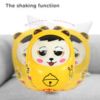 Close-up of the adorable animal face on the musical roly poly toy