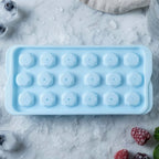 Stackable freezer ice tray for convenient ice storage