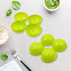 Compactly stacked plastic bowls, demonstrating space-saving storage.