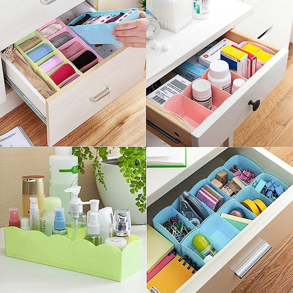 Four durable plastic storage organizer boxes stacked neatly, highlighting their compact design.