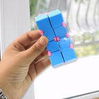 Infinity Cube stress relief fidget toy showing interlocking cubes