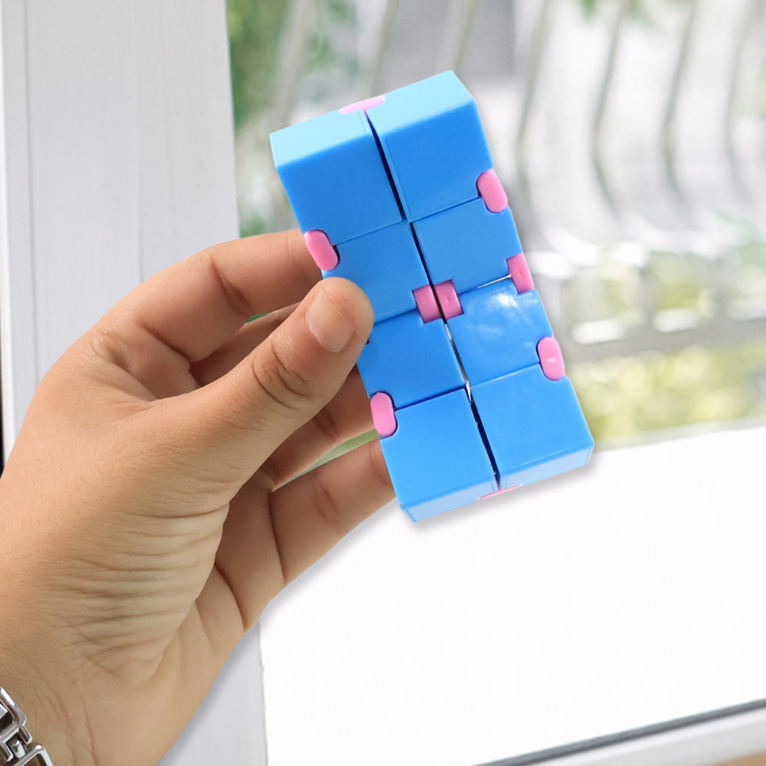Infinity Cube stress relief fidget toy showing interlocking cubes