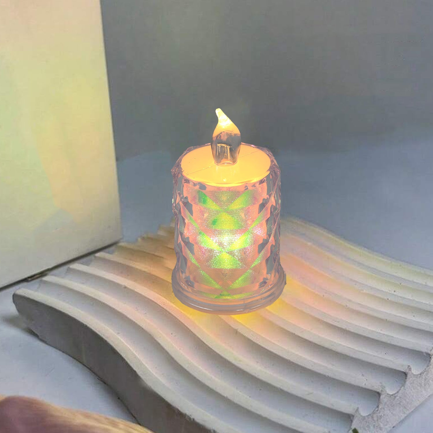 Compact LED tealight candle, safe for homes with children and pets, offering a cozy feel.
