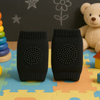 Black toddler knee protector made from breathable wool and sponge padding