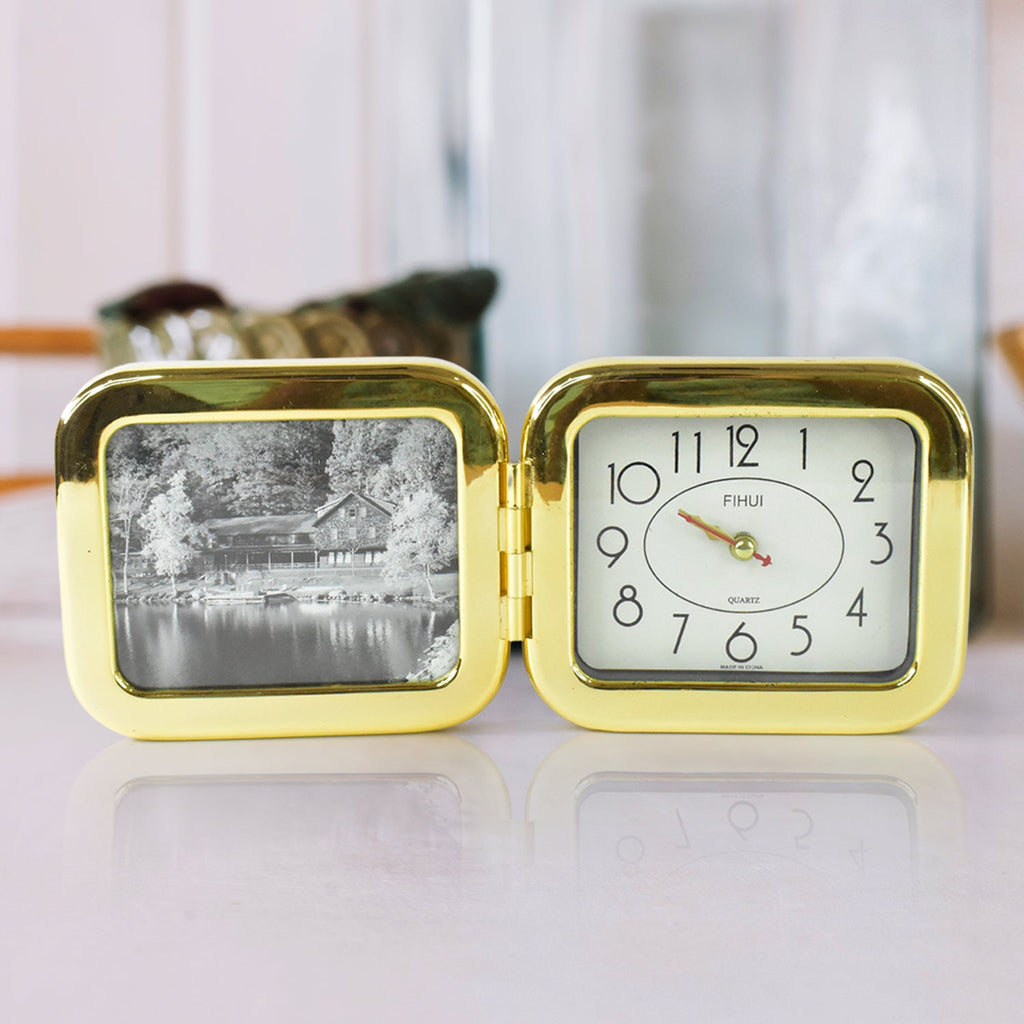 Folded desk clock showing its slim portable profile