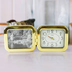 Folded desk clock showing its slim portable profile