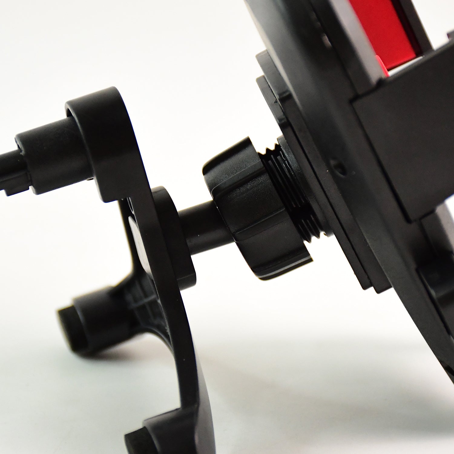 Side profile of the car mobile holder, showcasing its expandable arms and bottom support.