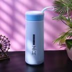Plastic bottle with blue lid and convenient carry strap
