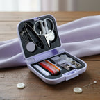 Compact portable sewing kit with organized threads and needles in case