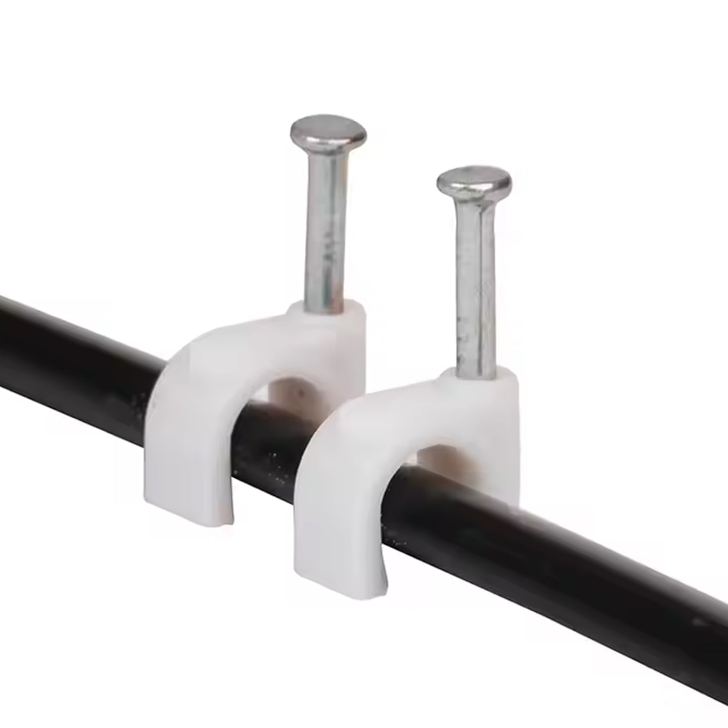 Close-up of plastic U-shaped 8mm nail cable clips with steel nails
