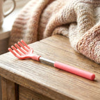 Compact Khujli Stick back scratcher, ideal for travel and easy storage.