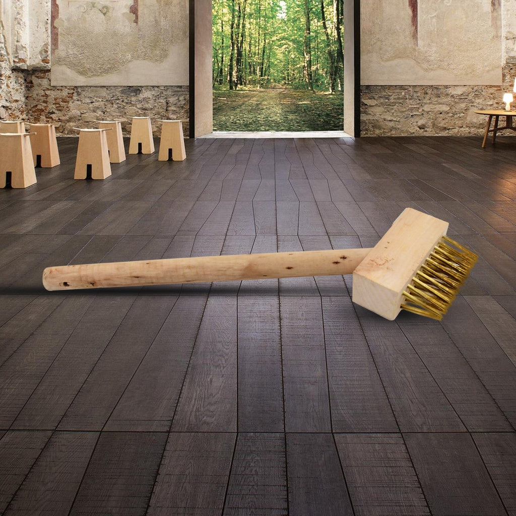 Patios cleaner brush showing its angled head for reaching tight gaps.