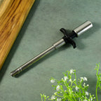 Close-up view of the tip of the stainless steel stove lighter showing ignition spark area