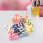 Variety of mini butterfly hair claws in different colours from the 6-piece set.