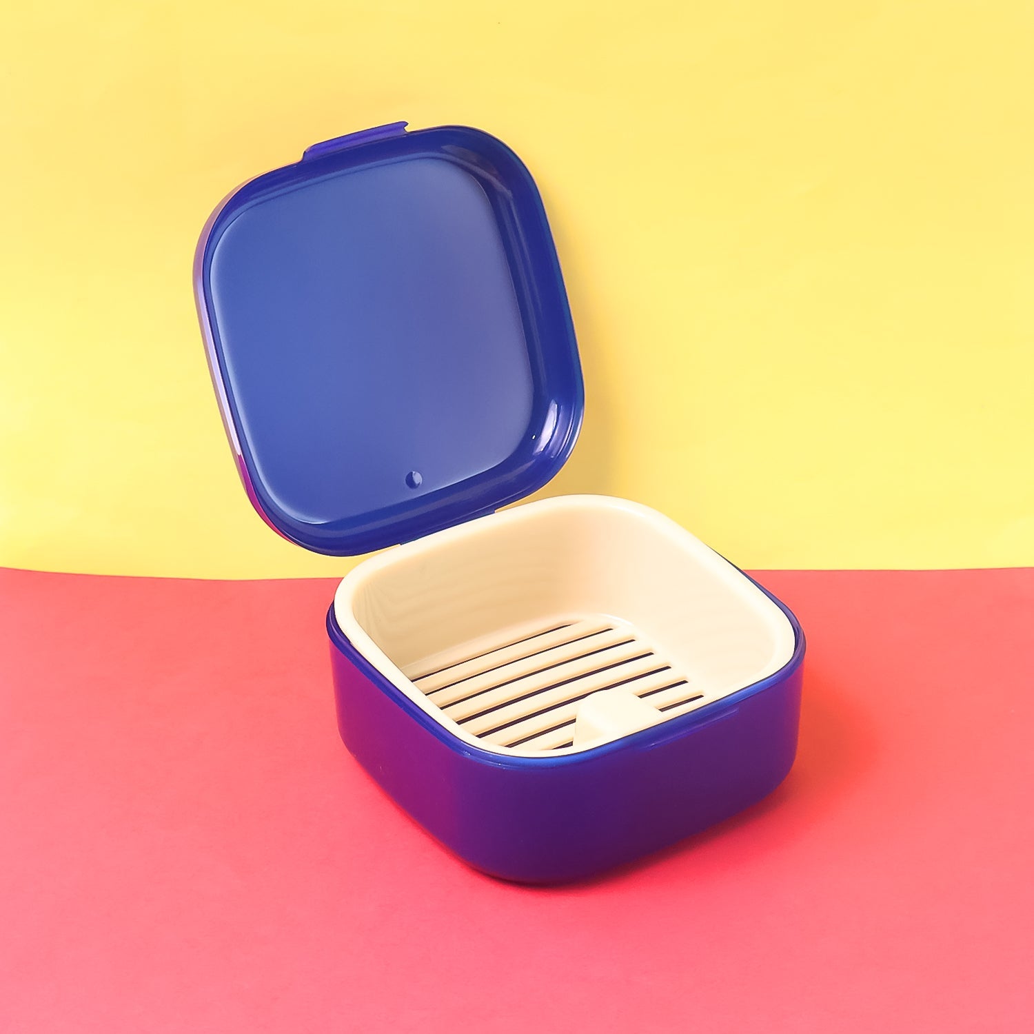 Oblivion storage box featuring a removable draining tray for moisture control