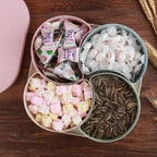 An open Divided Snack Box showcasing various organized snacks and dry fruits, ready for serving.