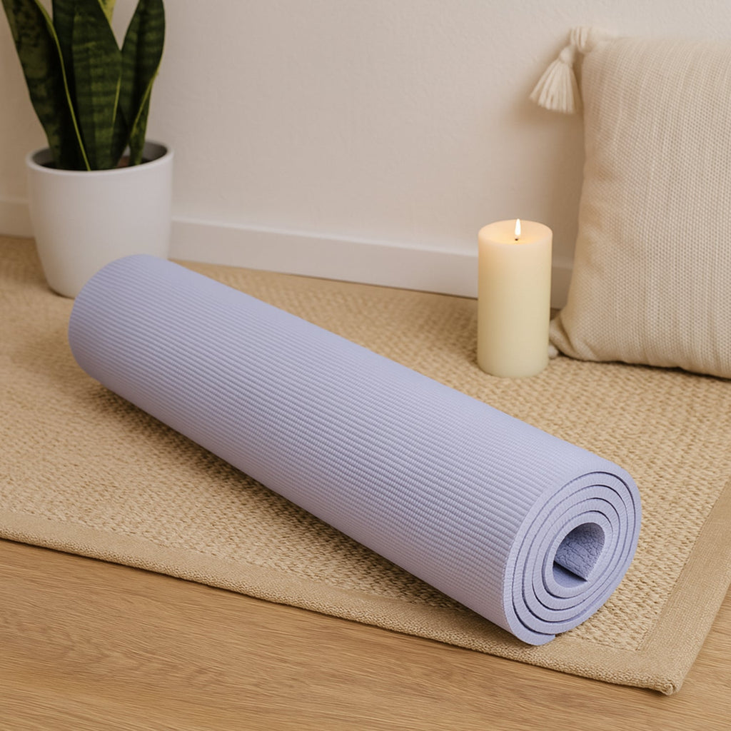 Yoga mat rolled for travel and home fitness use