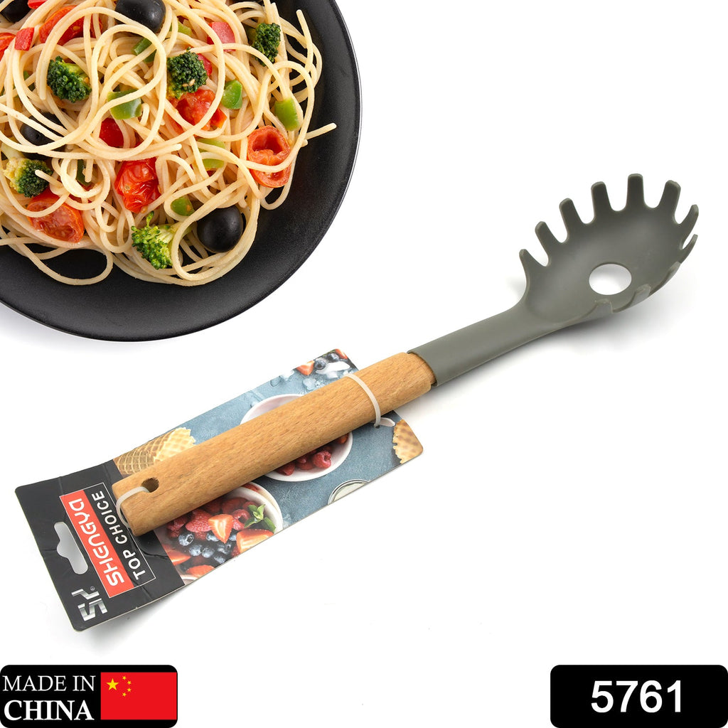 Close-up of the plastic pasta fork's tines, showing its non-stick safe design.