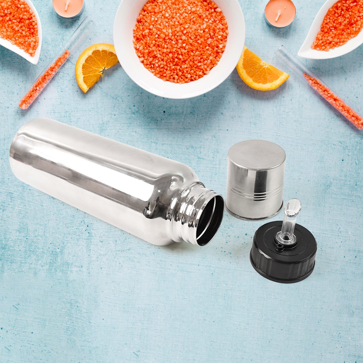 Top view of stainless steel oil bottle with ergonomic grip design