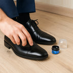 Instant shoe shine sponge housed in compact plastic box, travel-friendly