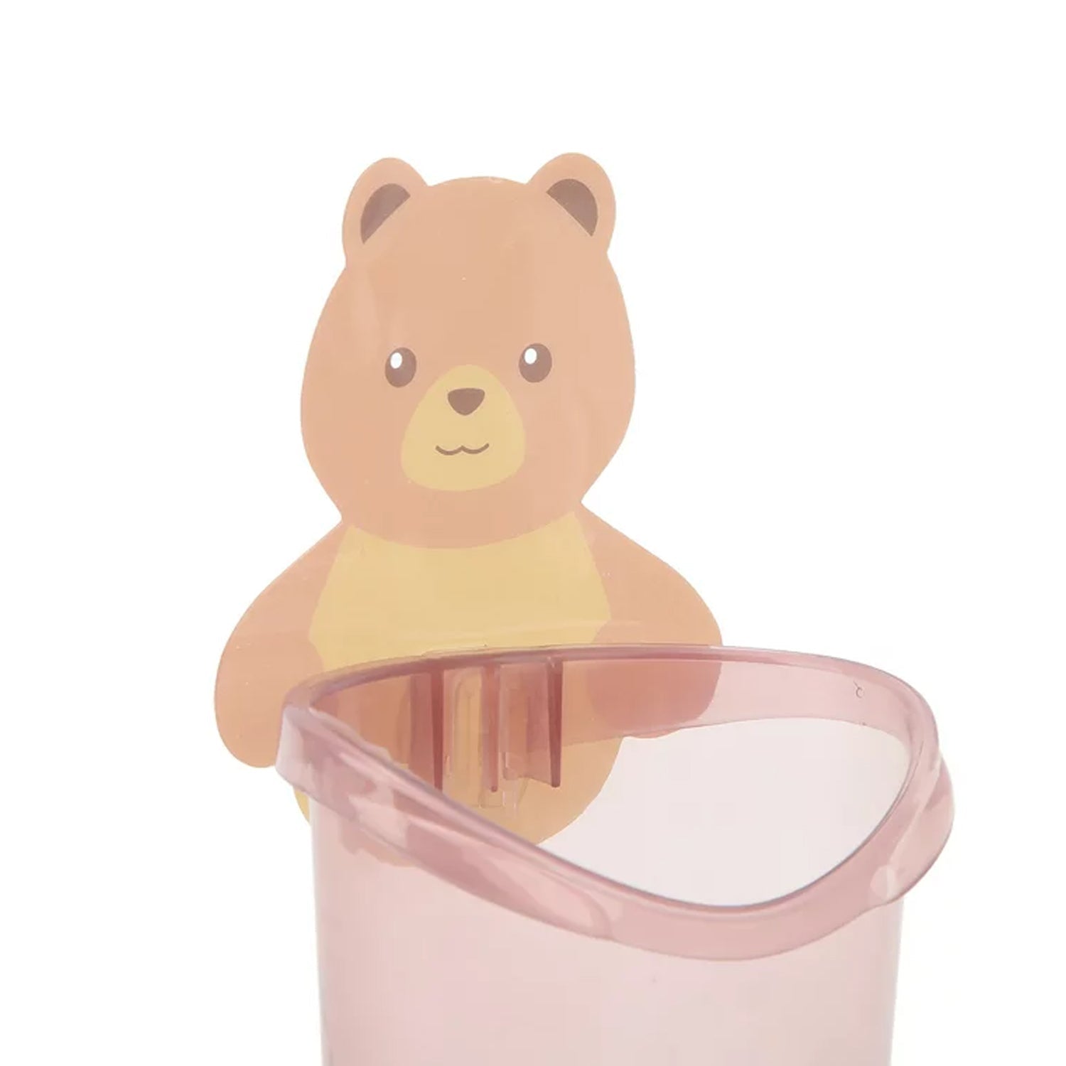 Side view of the teddy bear toothbrush holder, showing its compact design.