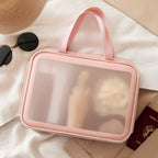 A BeautyBare multi-purpose wash bag filled with various toiletries and cosmetics, demonstrating its storage.
