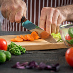 Durable natural wood cutting board on a kitchen counter.