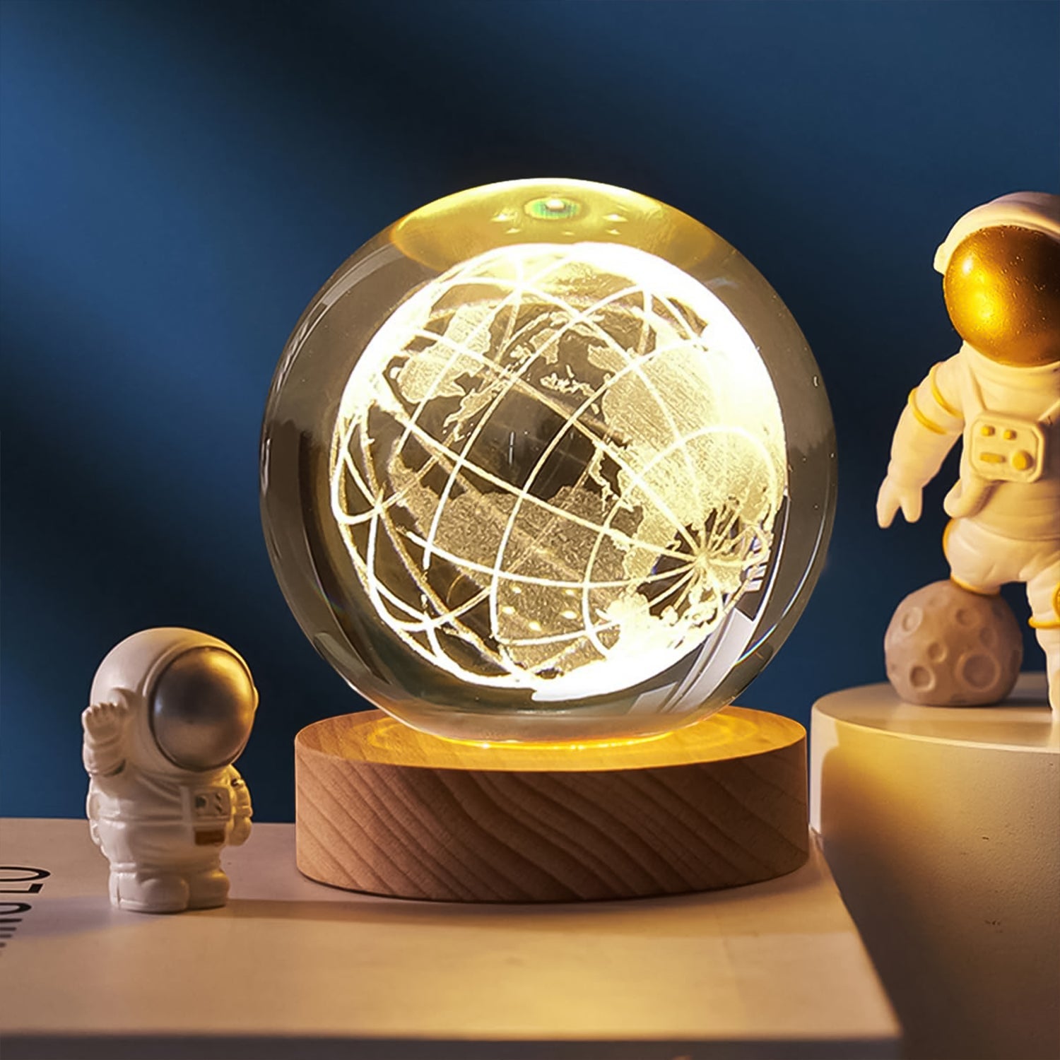 Elegant 3D crystal ball night light casting a soft glow in a modern room setting.