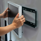 Close-up of heavy duty metal TV bracket showing solid construction