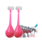 A child happily brushing teeth with the MintGuard Kids 3-Sided Toothbrush.