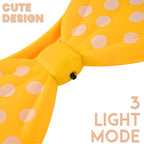 Close-up of LED glowing bow hairband showcasing polka dot design