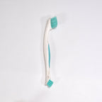 Back view of the Styleva dual-sided cleaning brush, highlighting its compact and practical design.