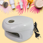 Woman curing gel nail polish with the AuriGlam LED UV Nail Lamp for a perfect finish.