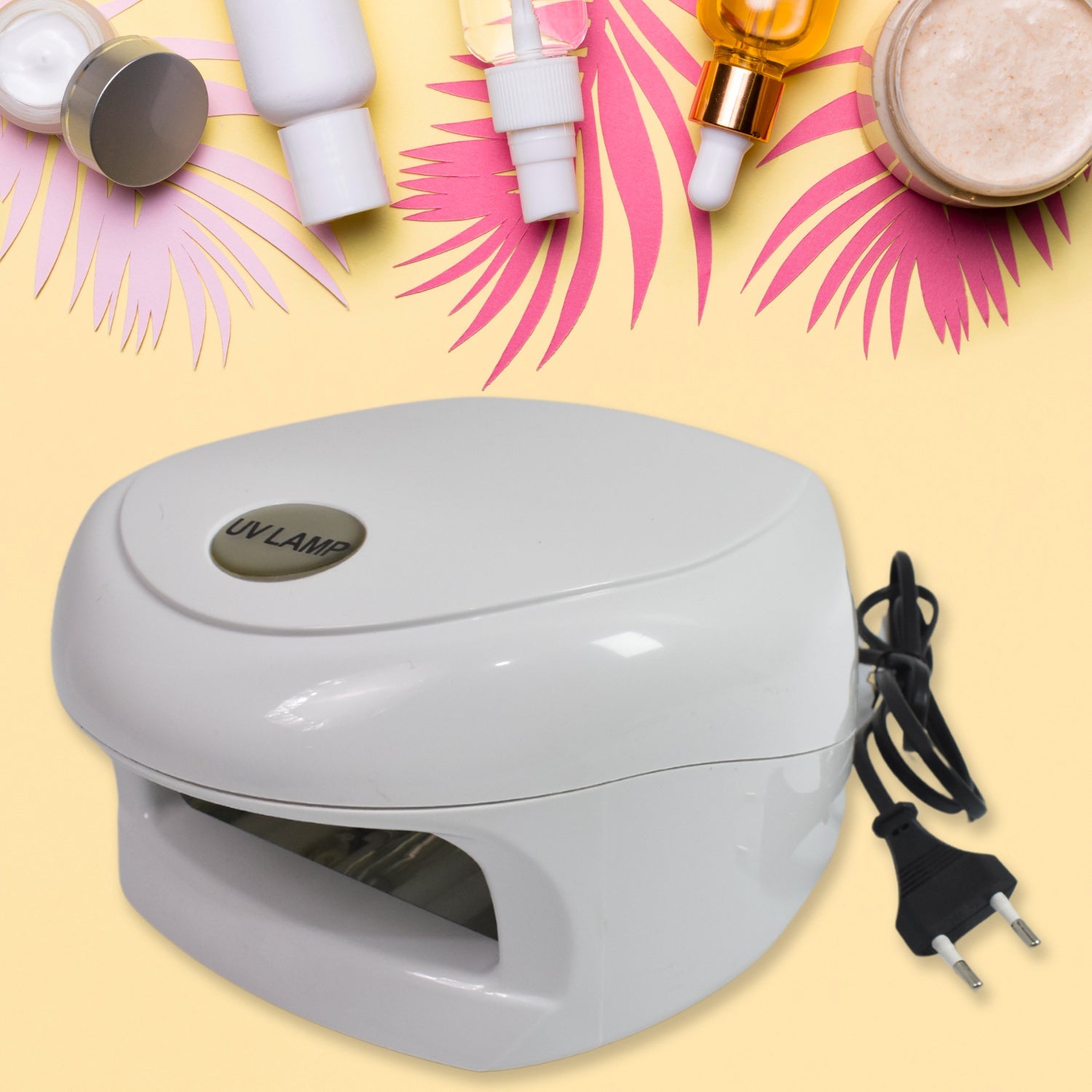 Woman curing gel nail polish with the AuriGlam LED UV Nail Lamp for a perfect finish.