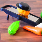 Adjustable vegetable slicer with stainless steel blades for kitchen use.