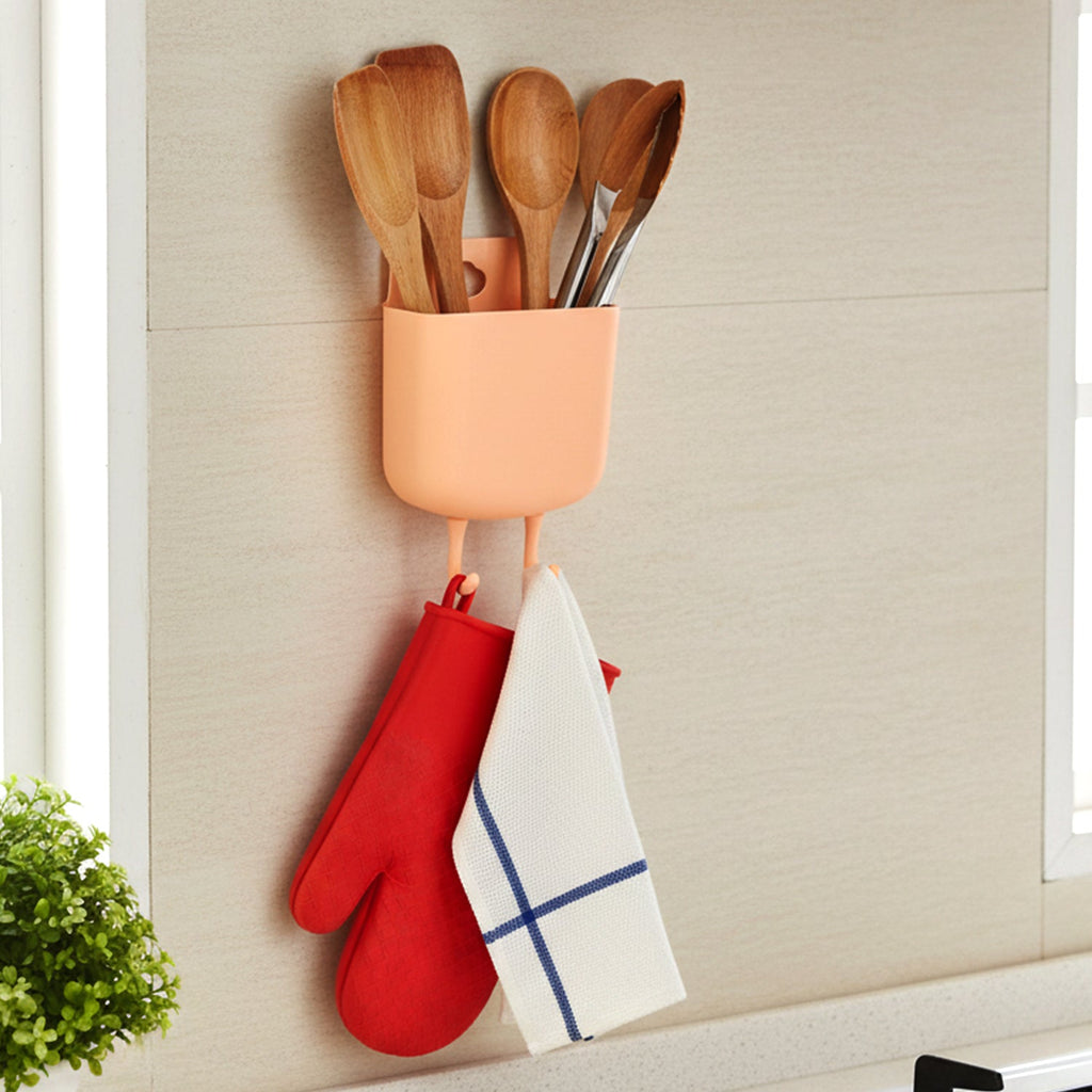 Plastic wall mounted organizer with compartments for phone and remotes