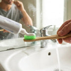 Bamboo toothbrush featuring ergonomic wooden handle for comfort