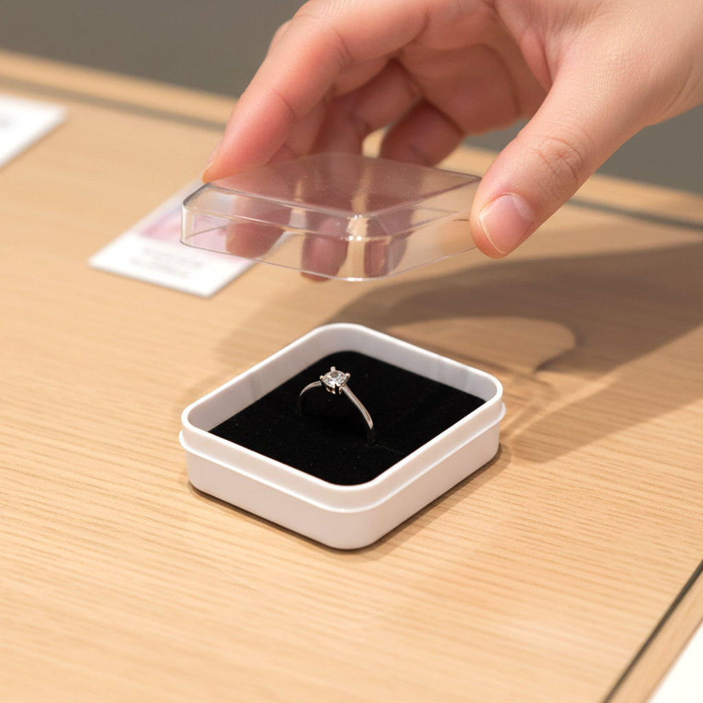 Top-down view of a single mini jewellery storage box with cushioned base