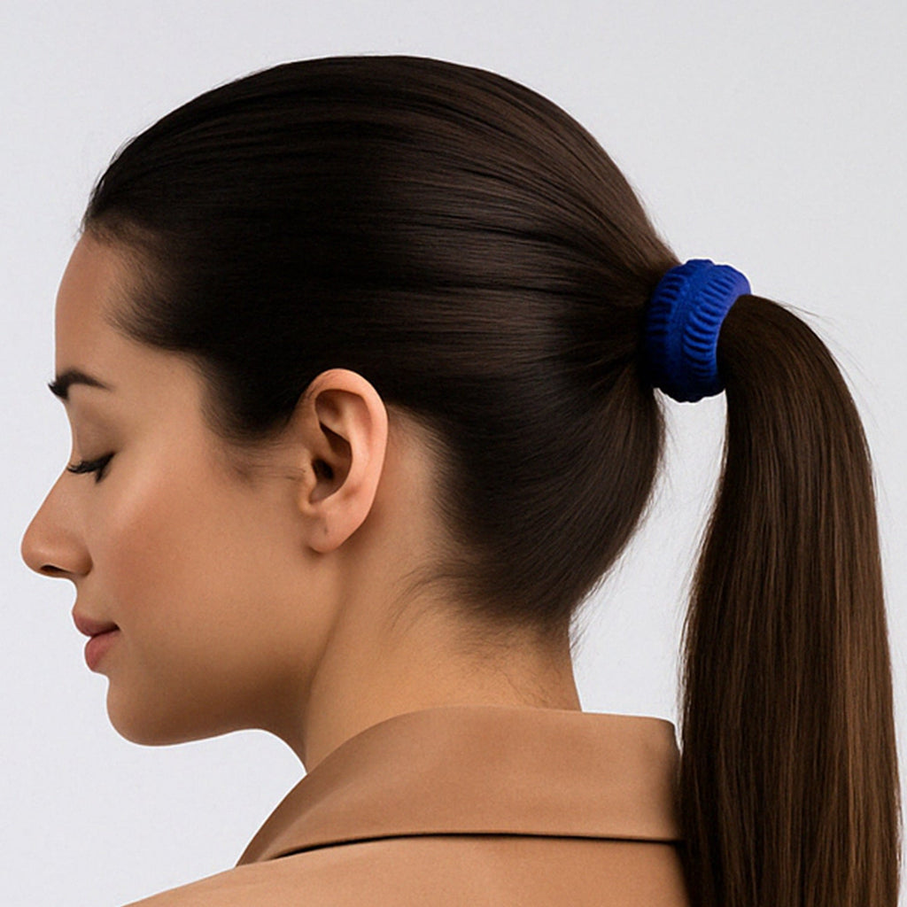 Three soft cotton tyre shape hair bands in various colours, neatly arranged.