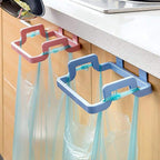 Front view of the durable plastic garbage bag holder for kitchen storage.