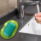 Image showing the strong self-adhesive backing of the plastic soap dish.
