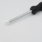Set of small tools including the XcelGrip Phillips screwdriver.