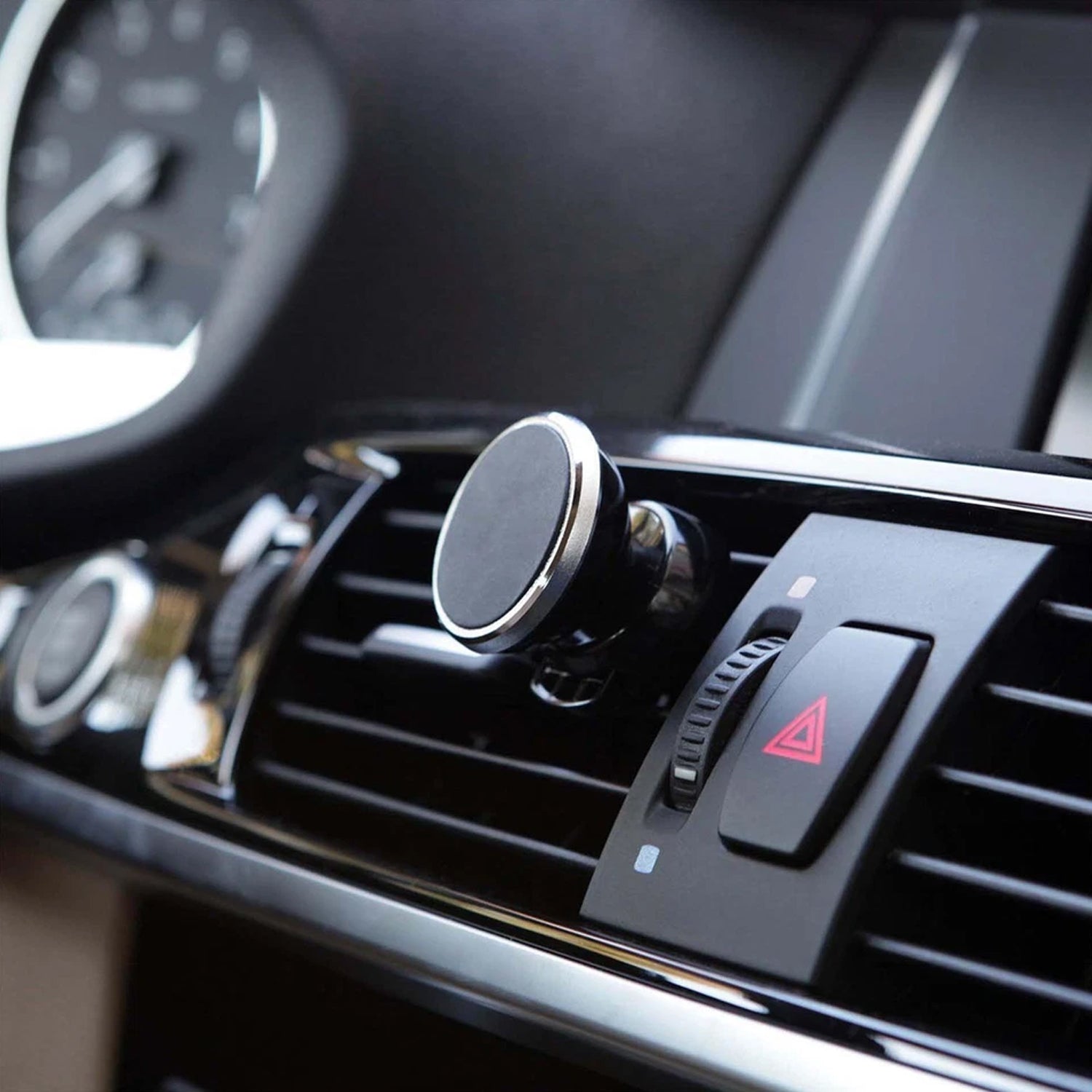 Minimalist style magnetic car phone holder mounted on air vent