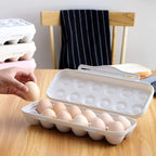 Close-up of shock-proof egg holder showing individual grooves preventing egg collision.