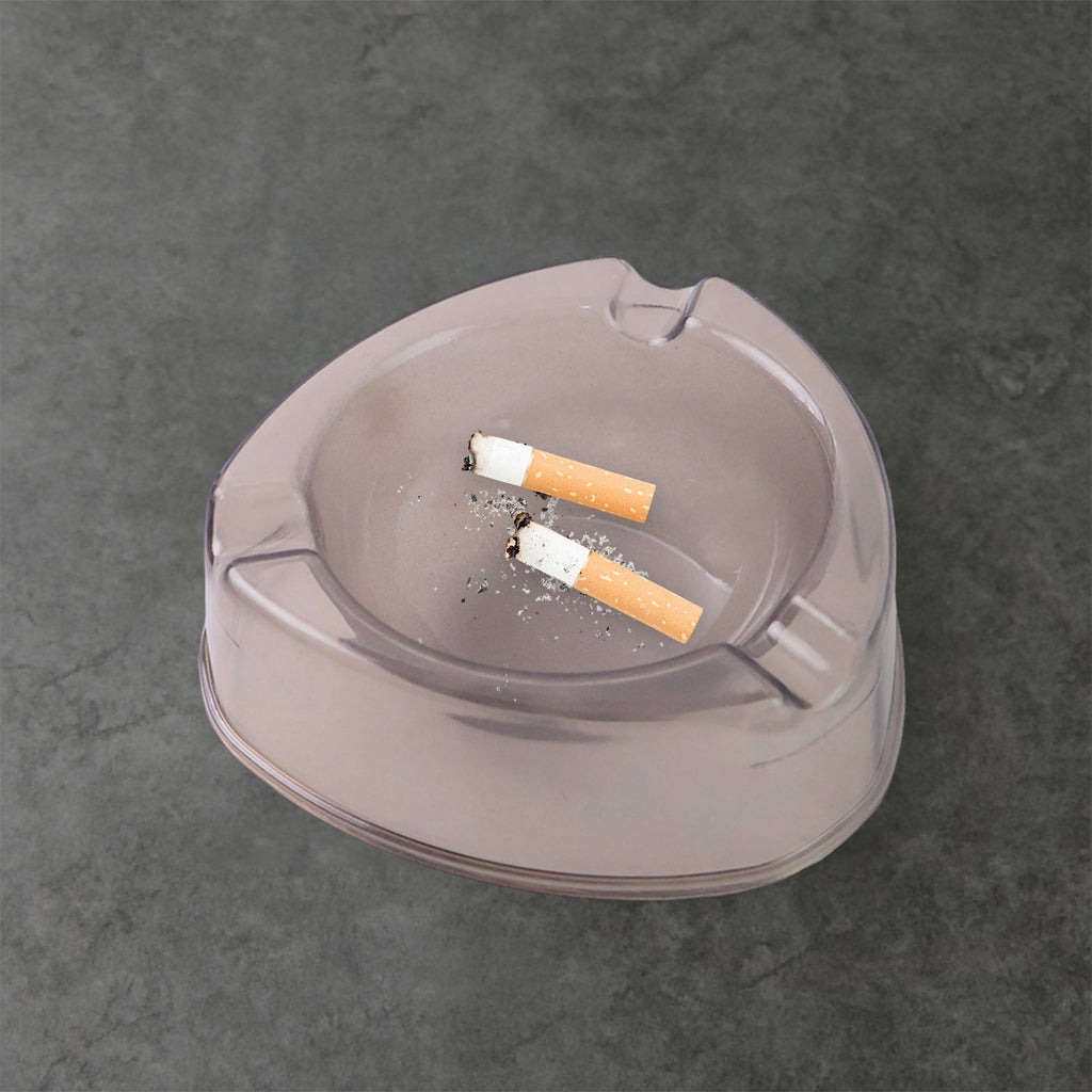 Heat resistant and sturdy plastic ashtray with cigarette grooves
