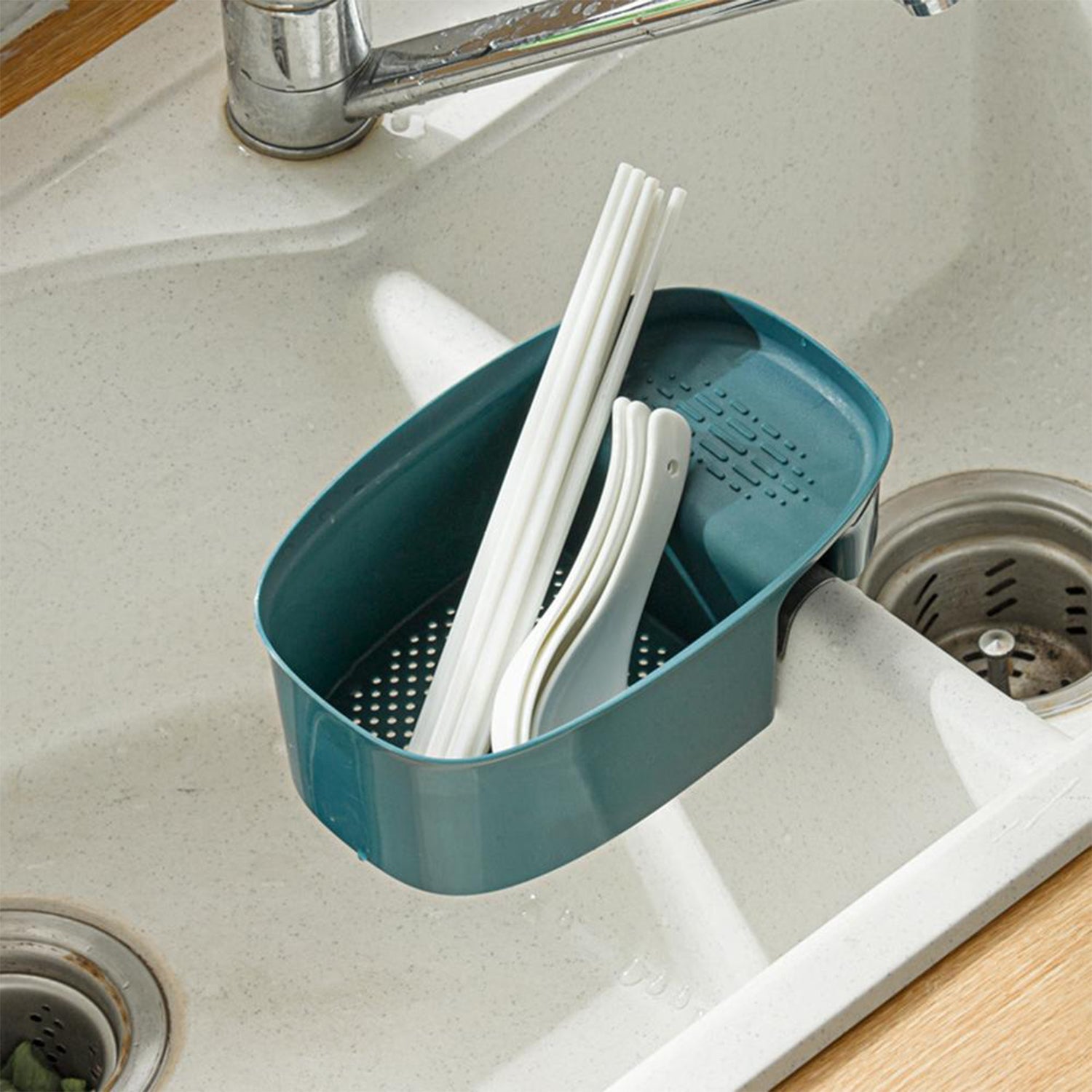 Quickslice kitchen dish drainer for drying utensils and vegetables in the sink.