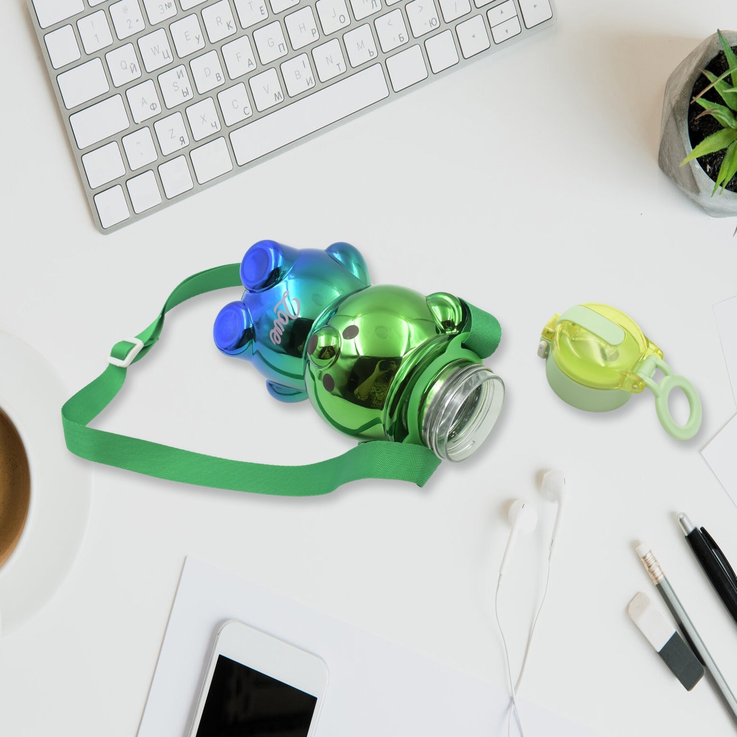 Versatile kids' water bottle with a detachable cup lid for easy drinking.
