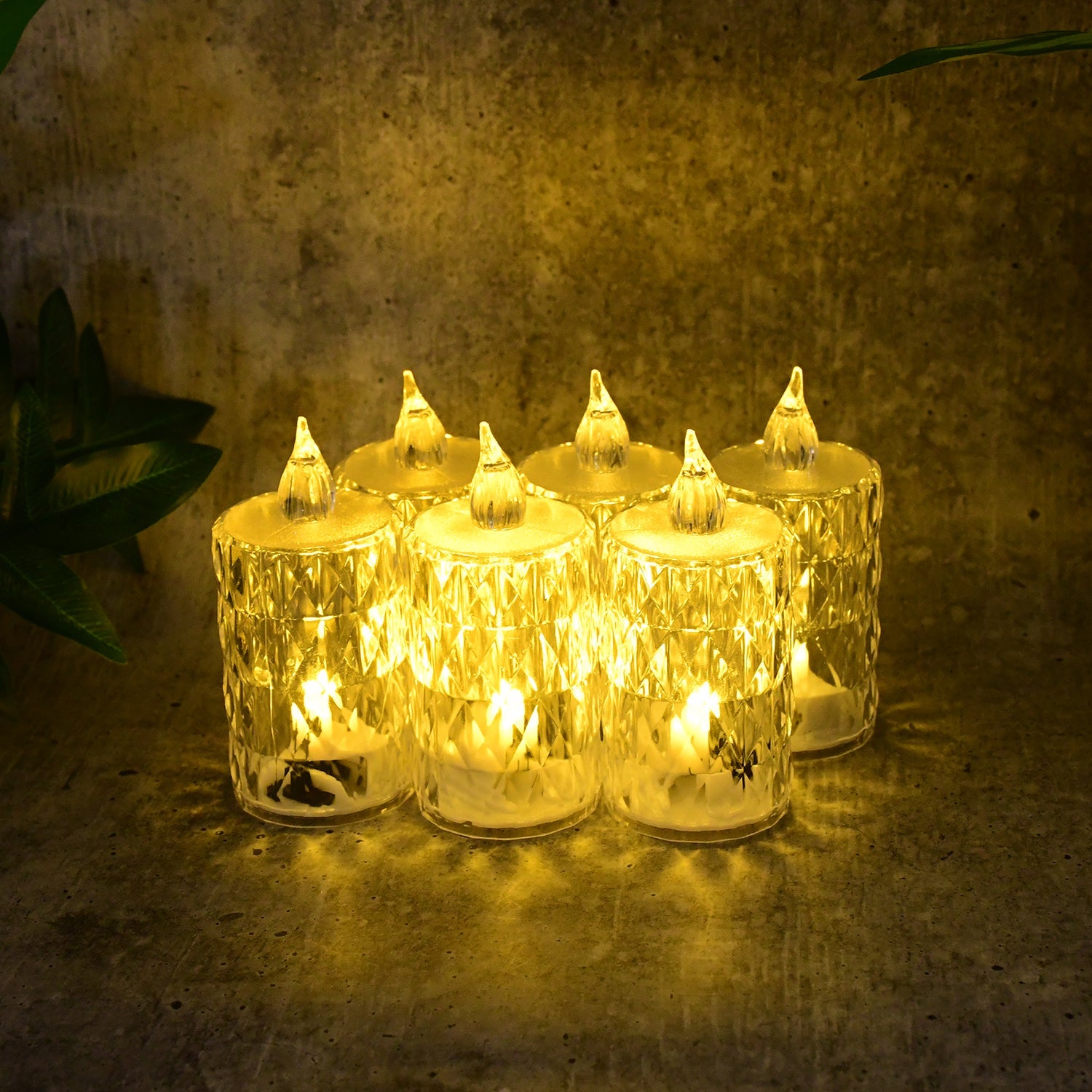 Flameless LED crystal candle set glowing with warm flickering light