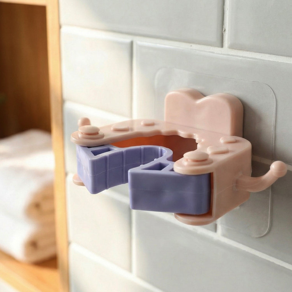 Holder clip gripping cleaning tool handle effectively on wall